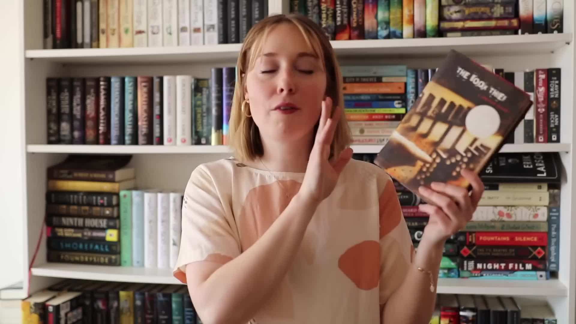 Arranging books in small vignettes with decorative items