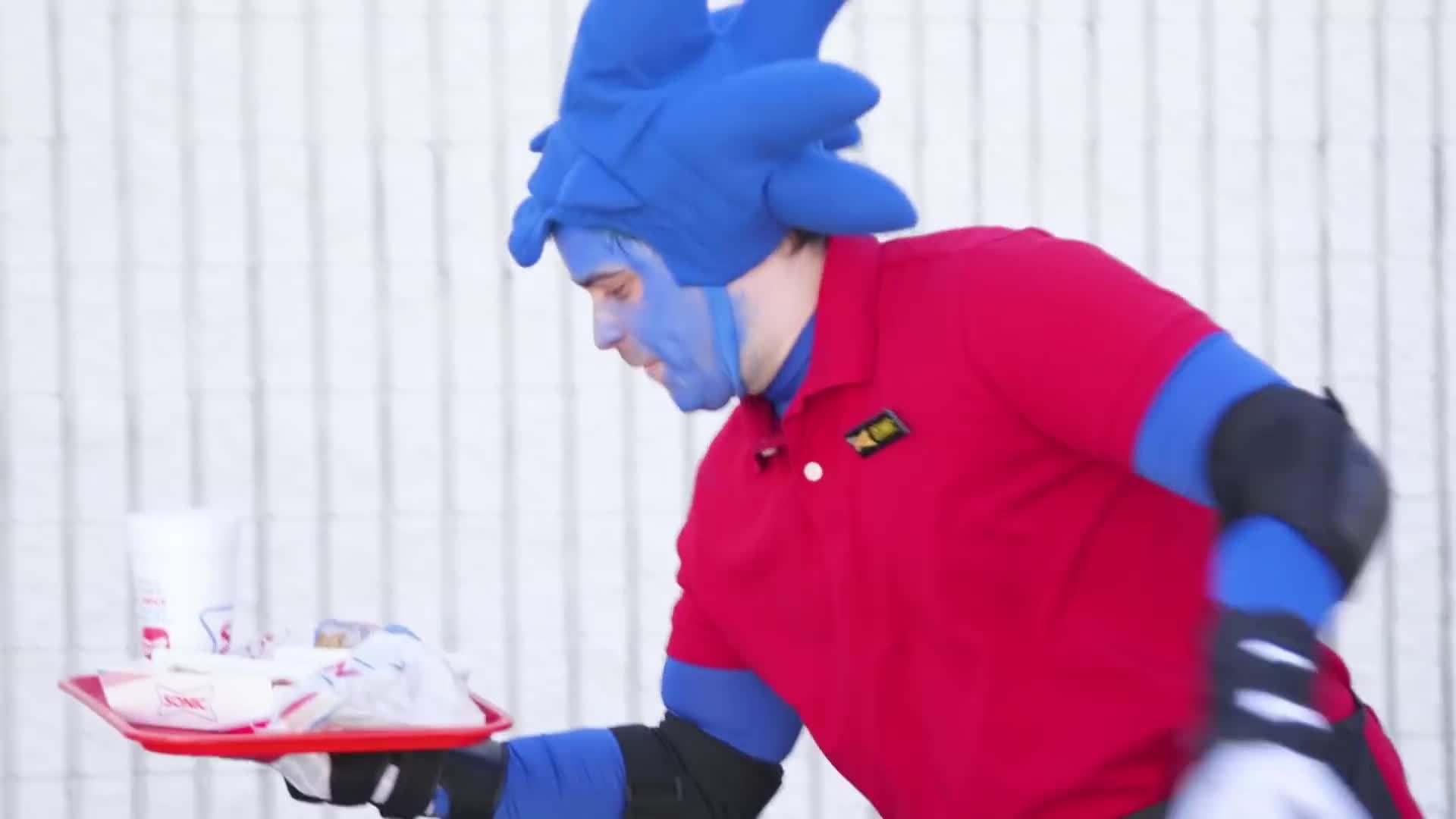 Sonic delivering a chili dog with lightning speed