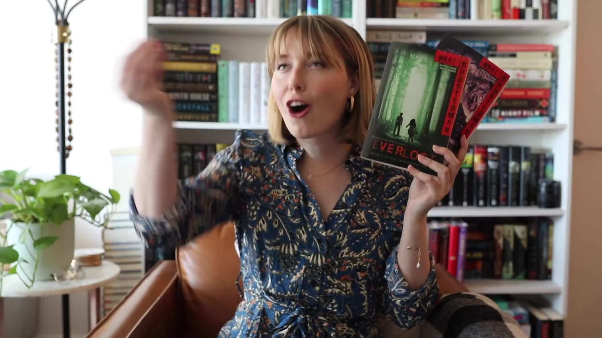 Books with sentimental value being put back on the shelf