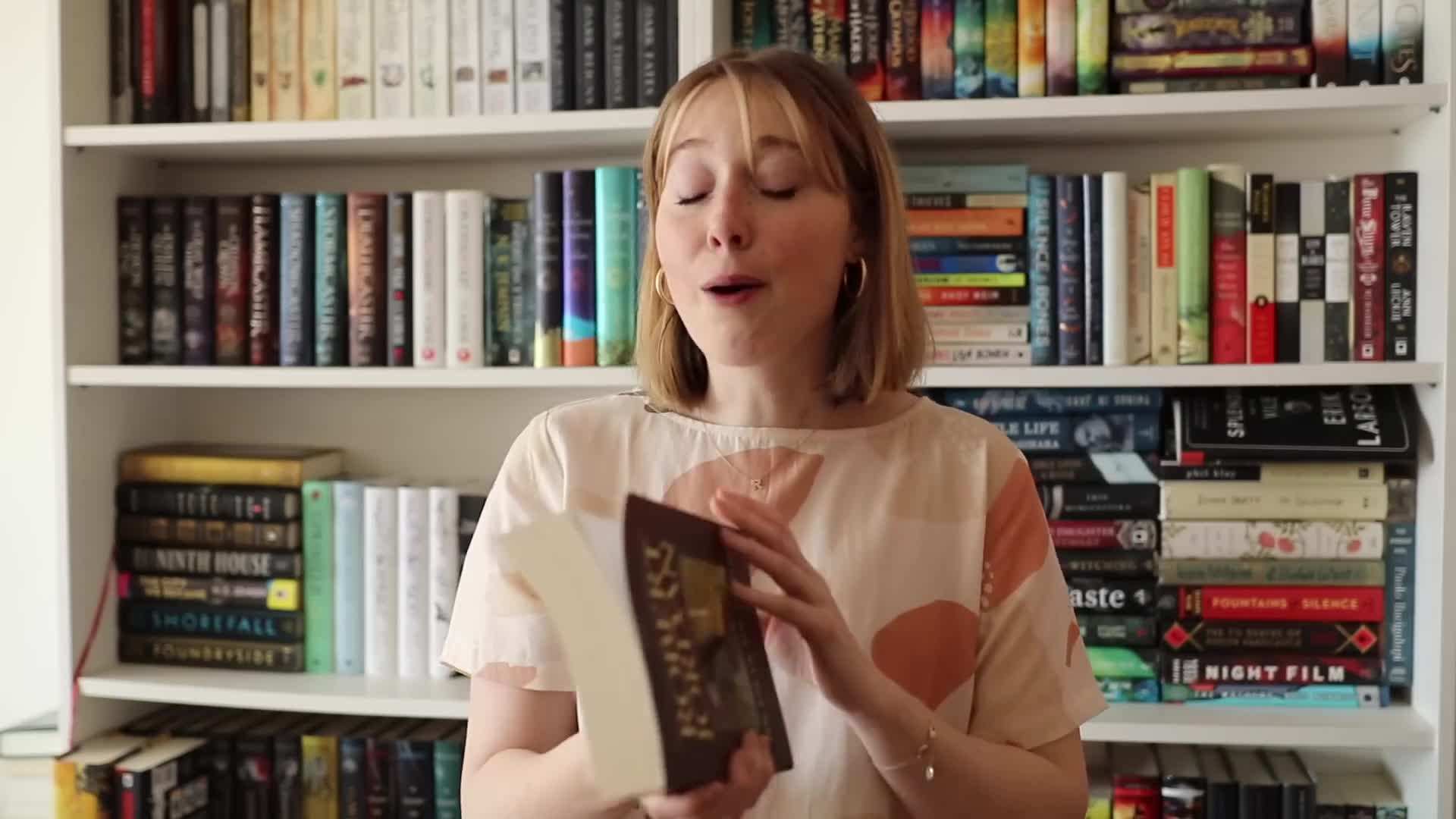 Using transparent book covers to protect books from dust