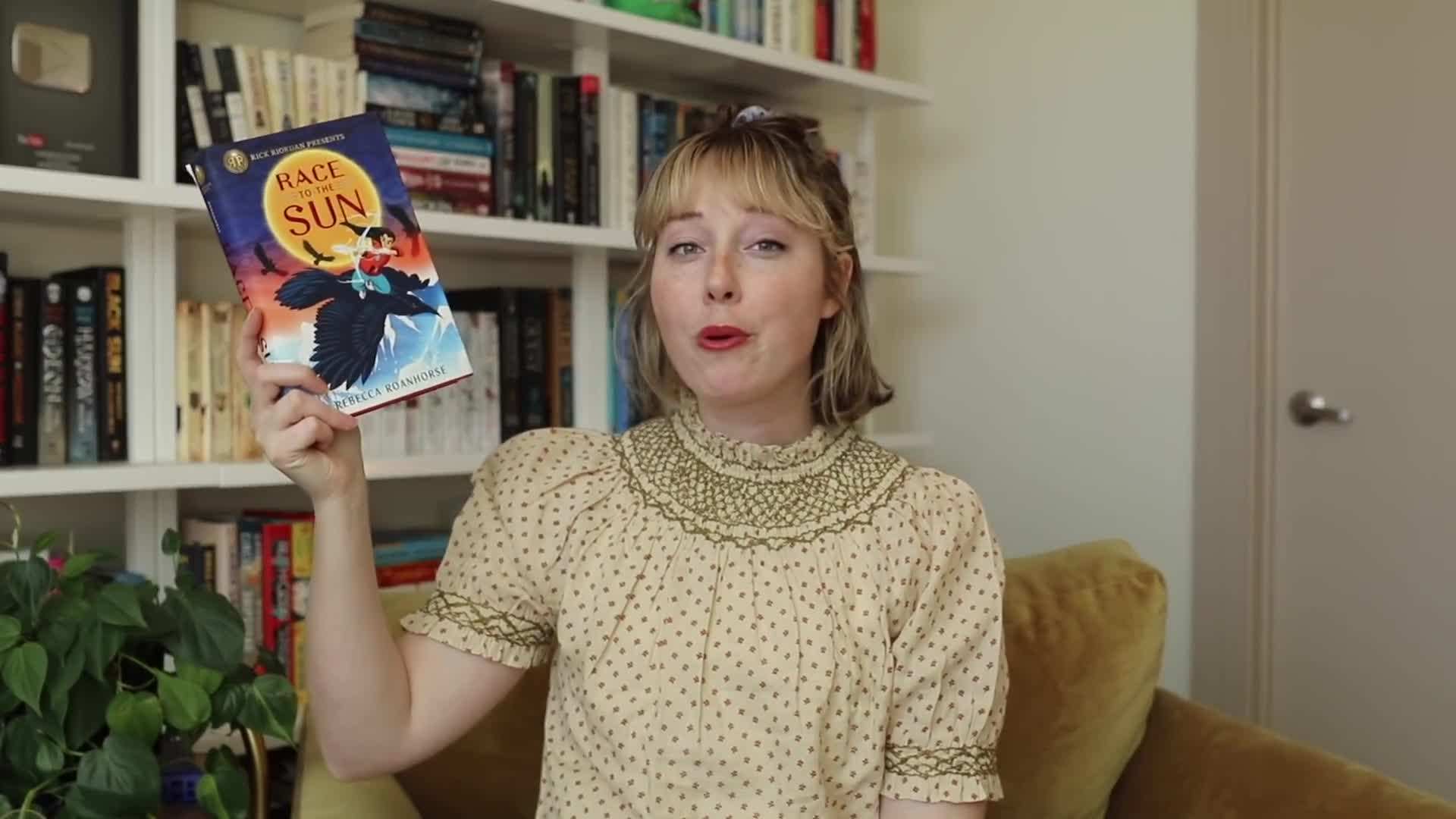 Unread books stacked on my bookshelf