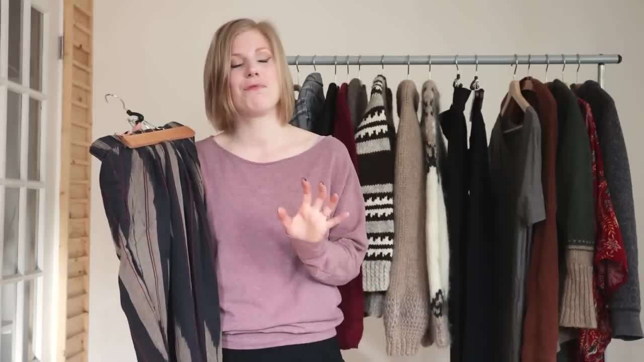 Longline cardigan layered over a button-down shirt for a sophisticated outfit