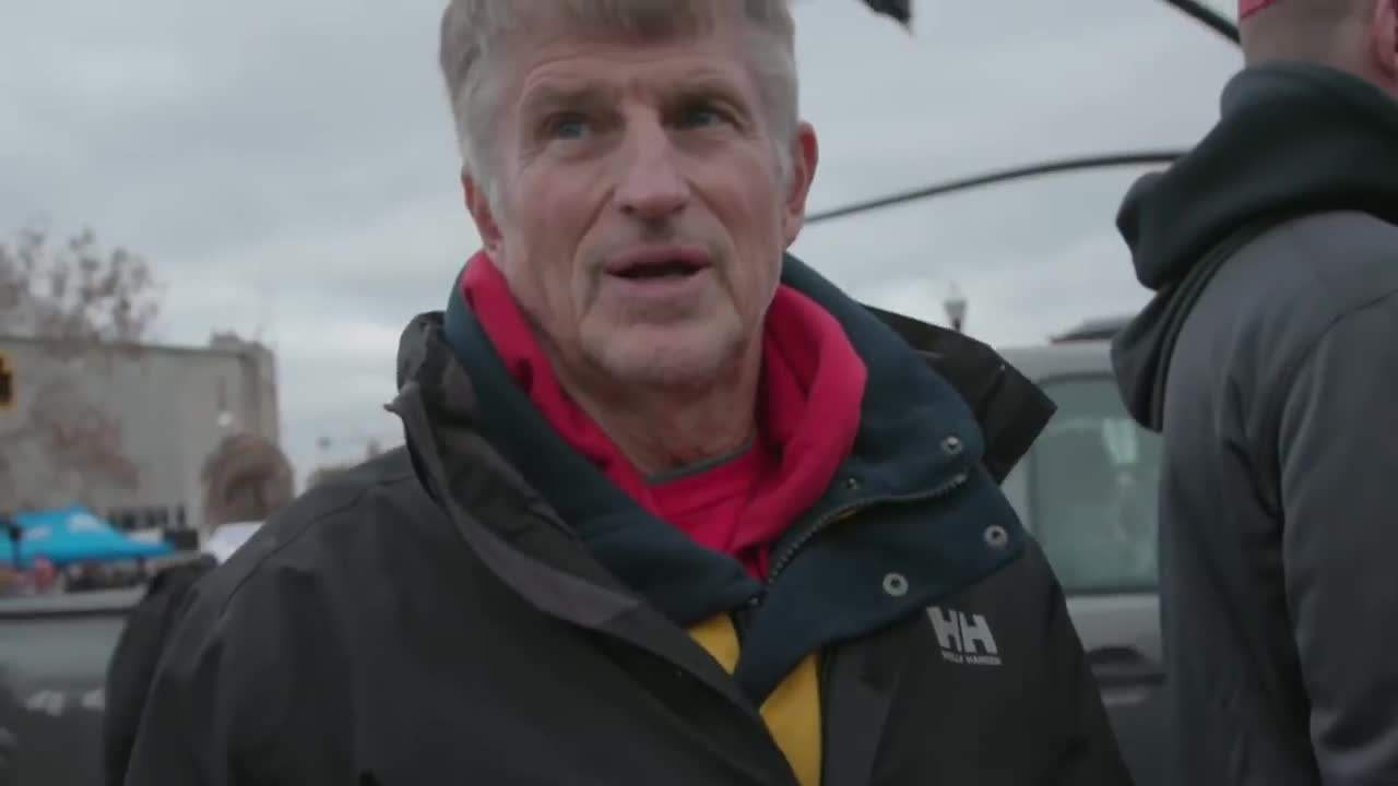 A plate of grilled chicken with vegetables