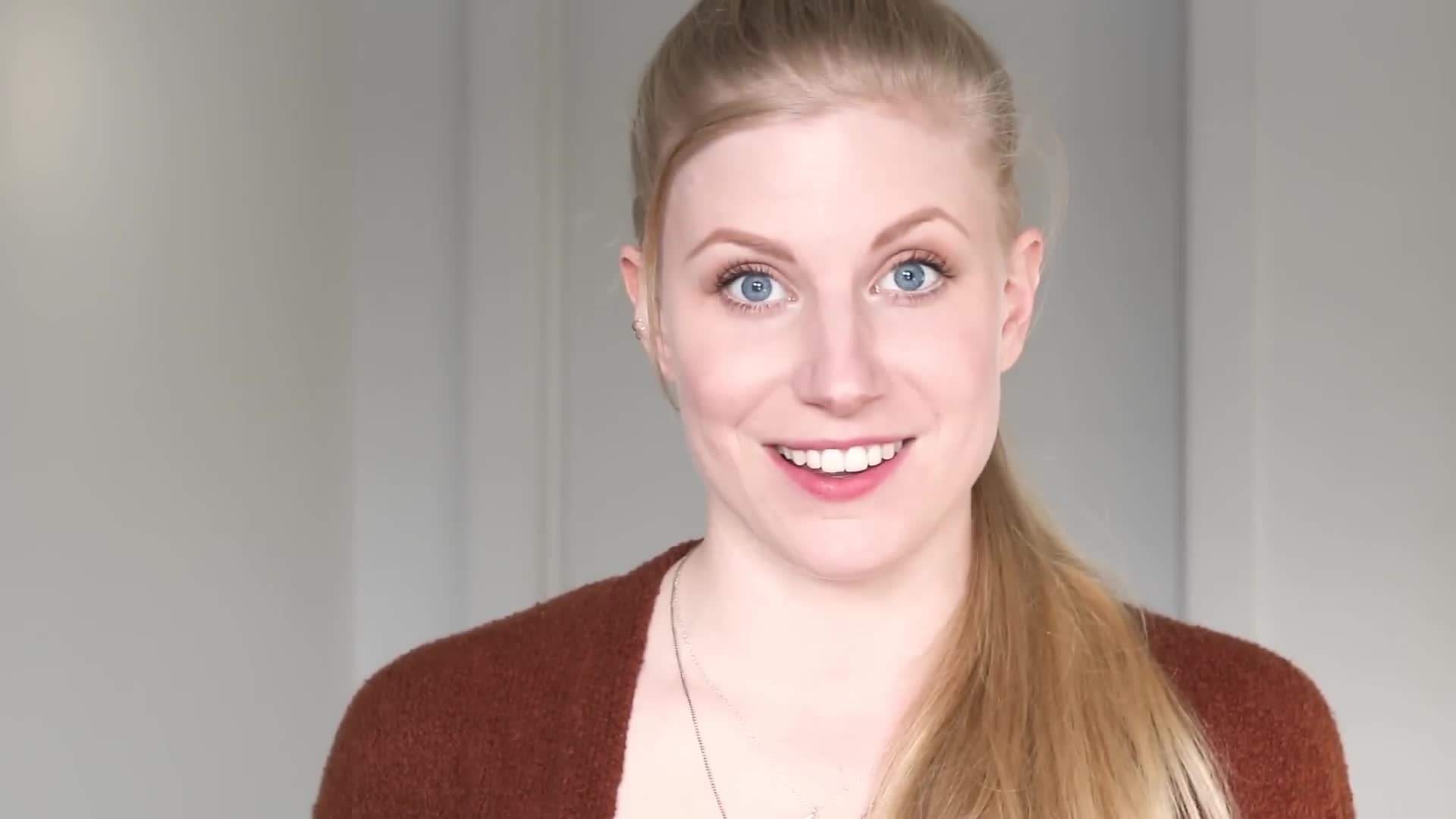 Hands dropping coins into a donation box