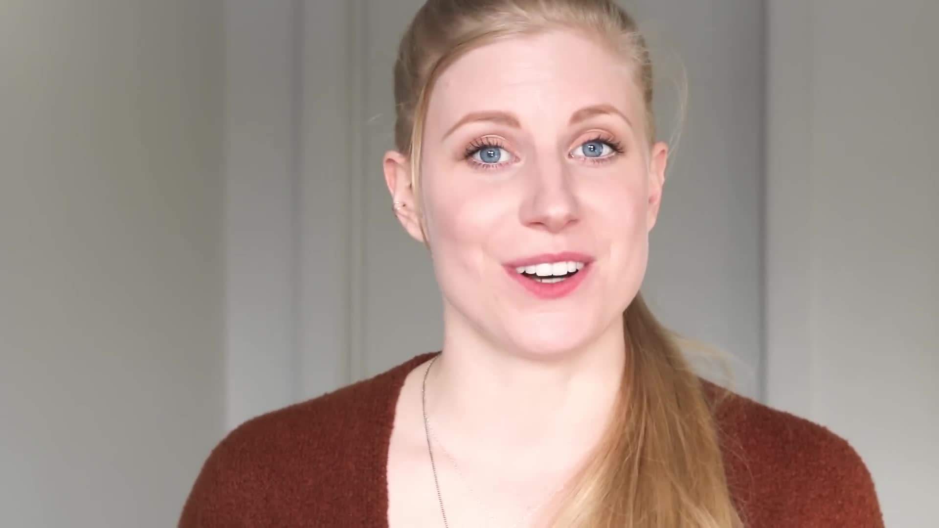 Happy shopper holding a bag of secondhand treasures