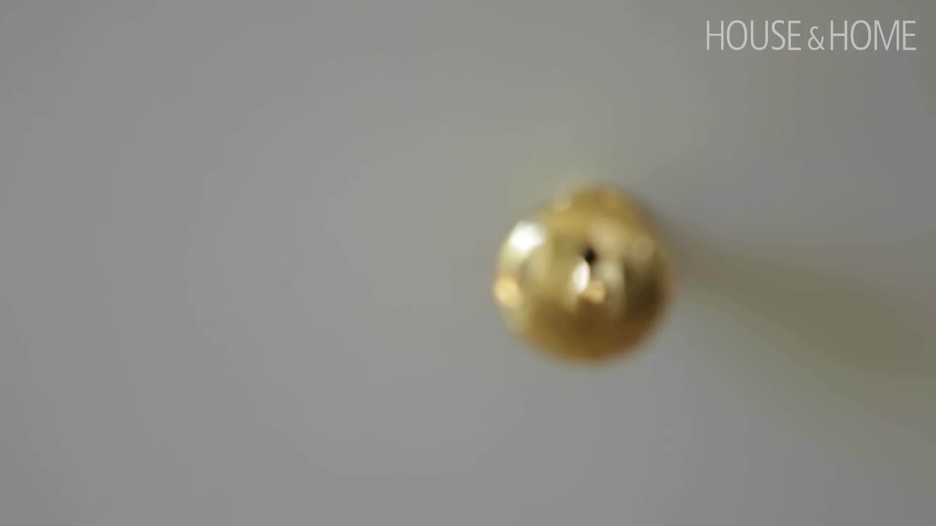 Vintage farmhouse sink as a centerpiece in an English-inspired kitchen