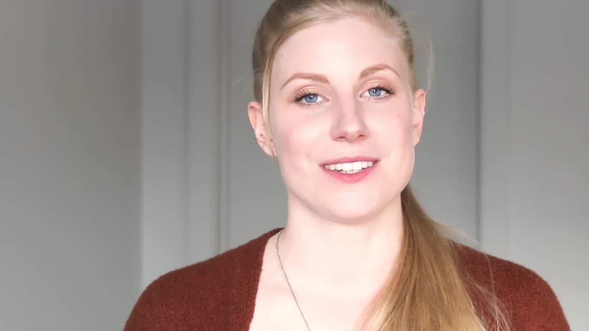 Happy customer with a bag of sustainable products from Shop for Good Sunday