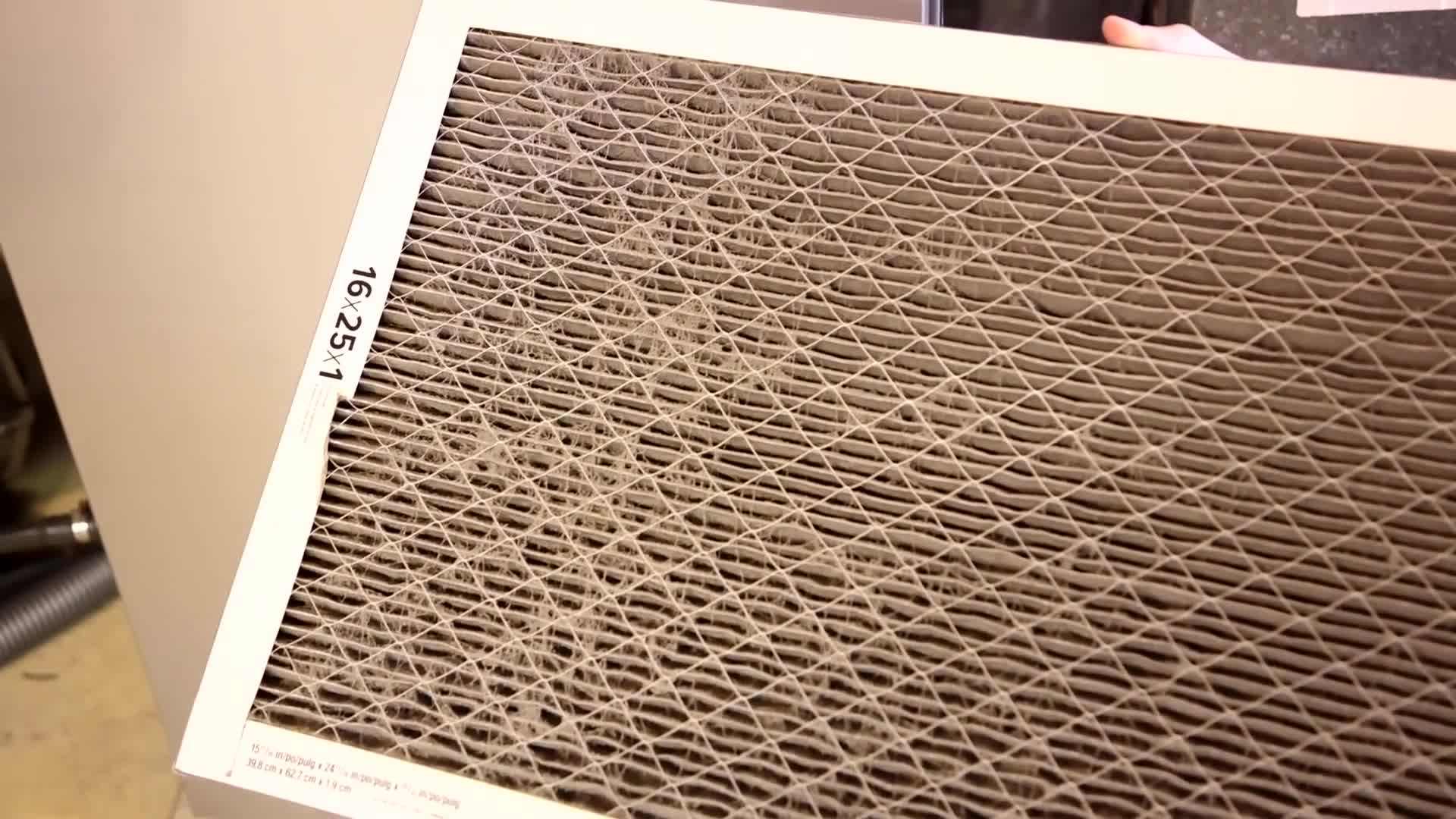 Vacuuming carpets with a HEPA filter