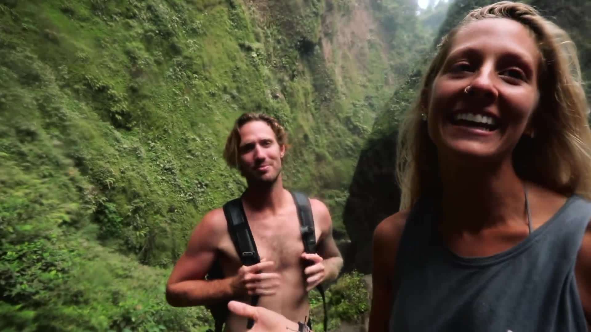 Taking a dip in the natural pools at the base of the waterfall