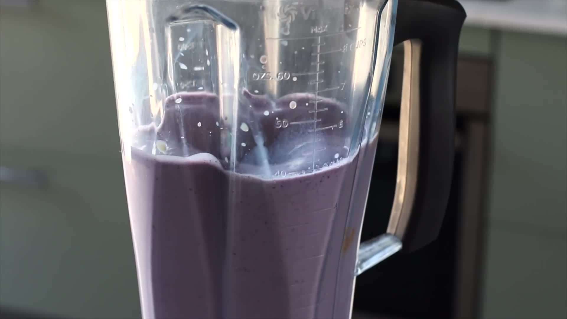 Vertical shot of the green smoothie in a glass