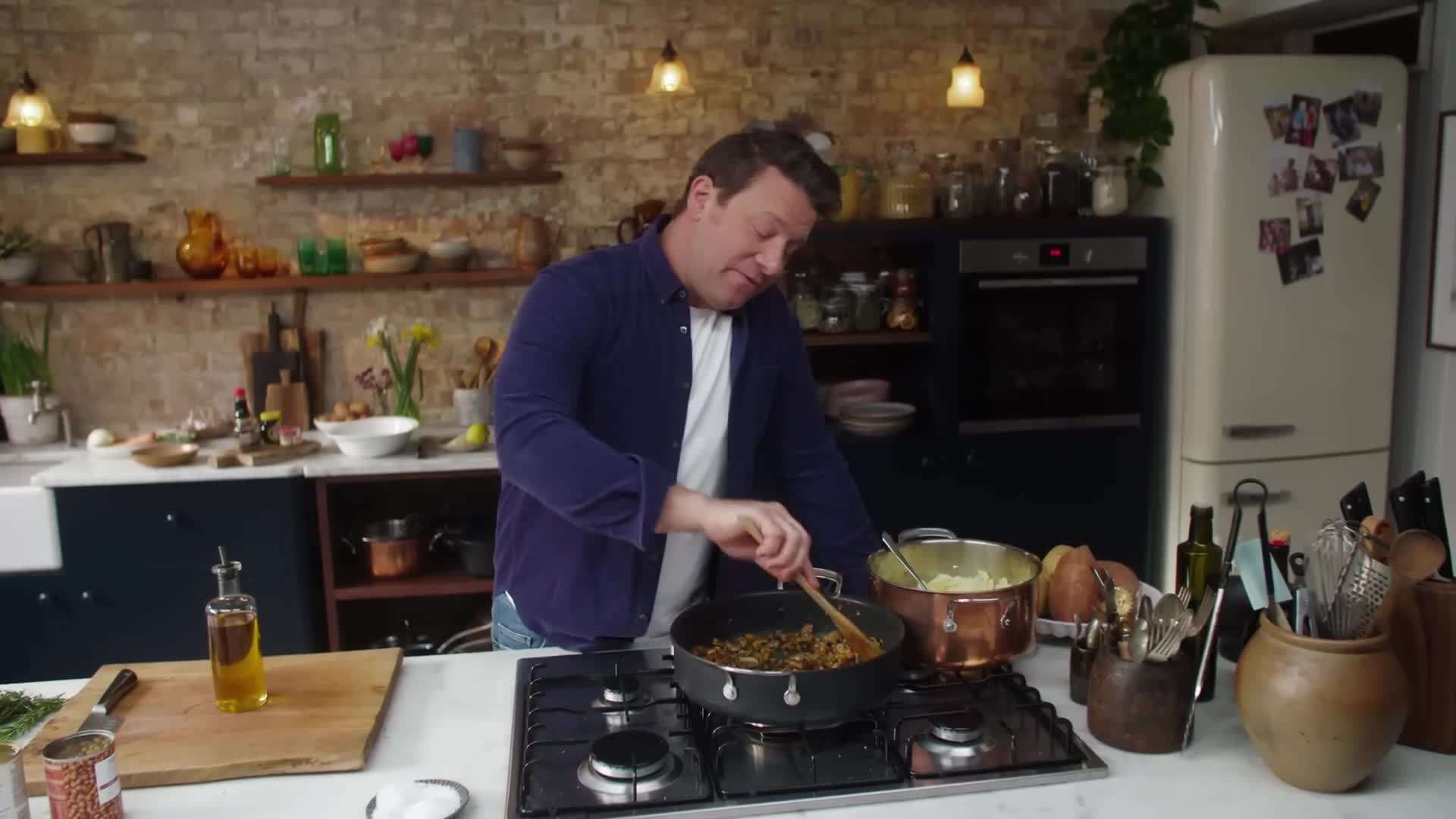 Jamie Oliver demonstrating the cooking process