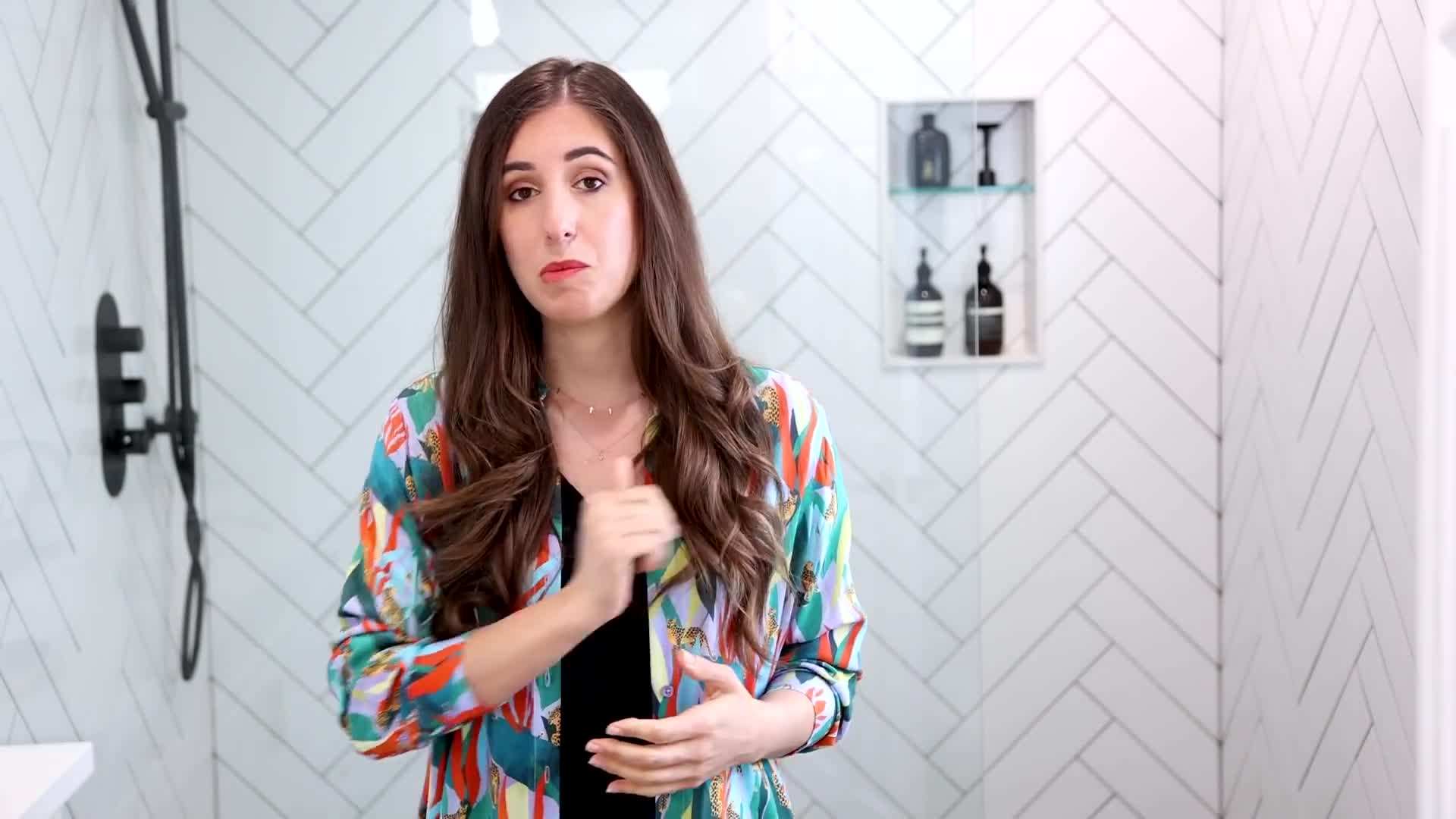 Gently scrubbing the tiles with a soft-bristle brush