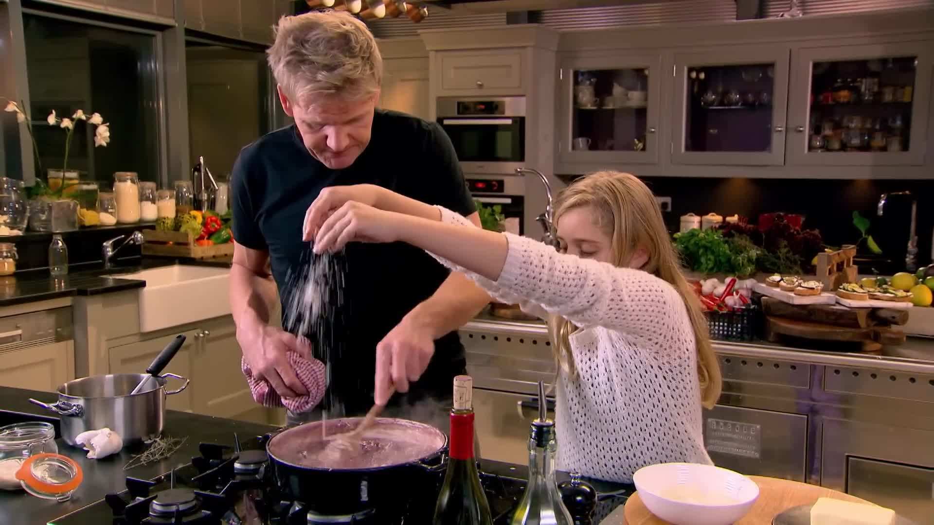 A colorful salad with grilled halloumi cheese and fresh fruits