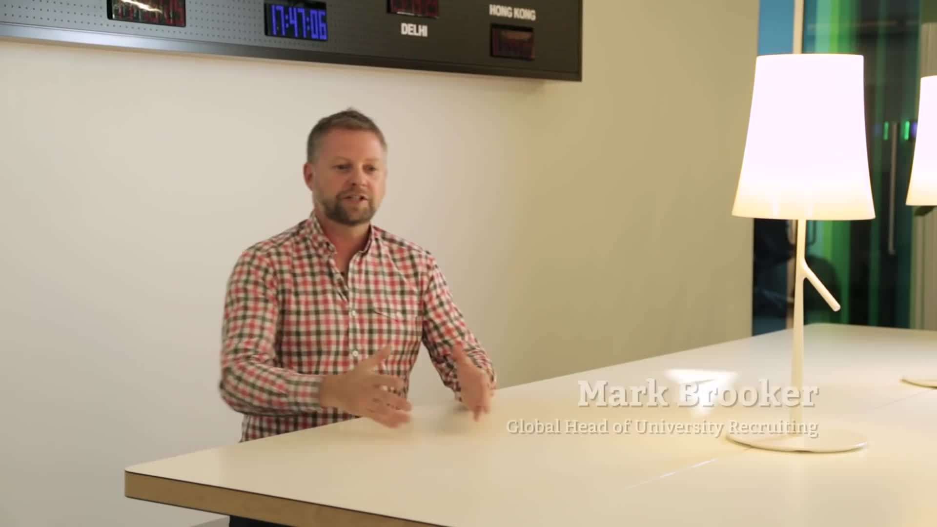 Expedia engineers working together on a project, promoting teamwork and collaboration