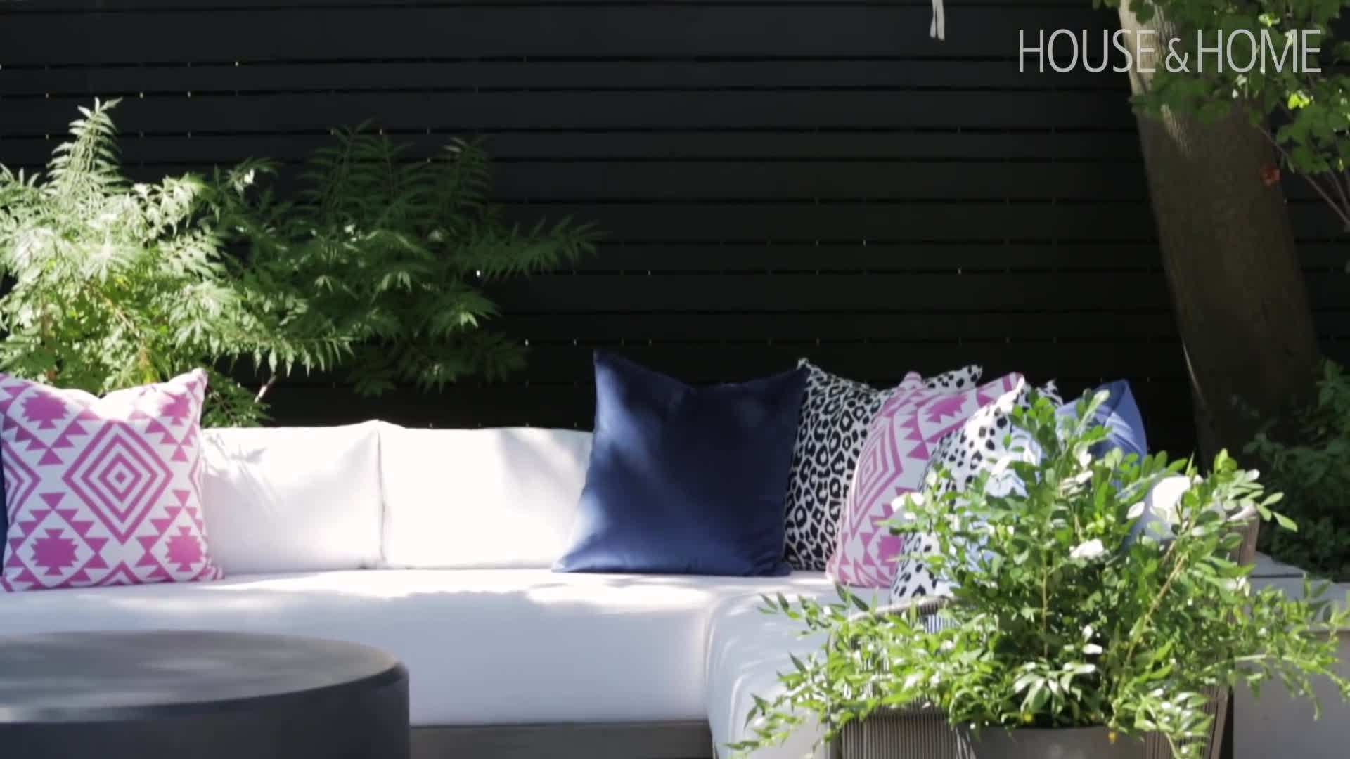 The backyard oasis with a play area and seating