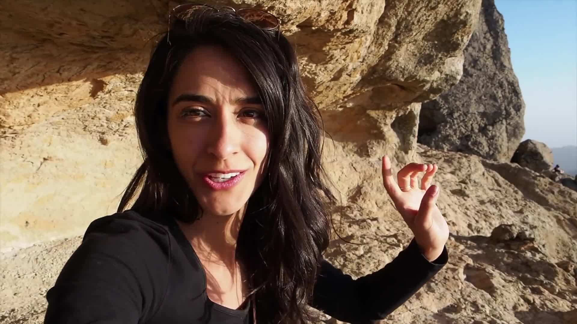 Packing cubes and folded clothes in a suitcase