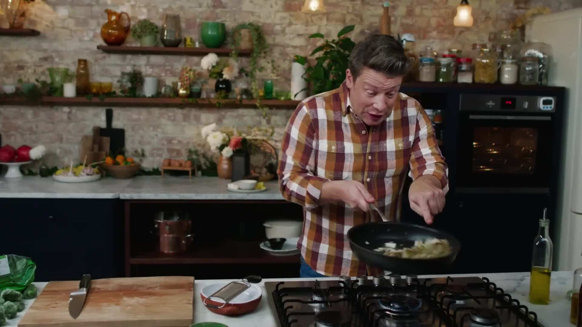 Fresh spinach leaves being blanched in boiling water