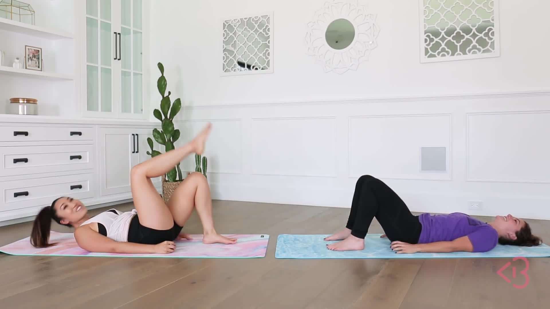 Squeezing the glutes during single leg raisers in bridge