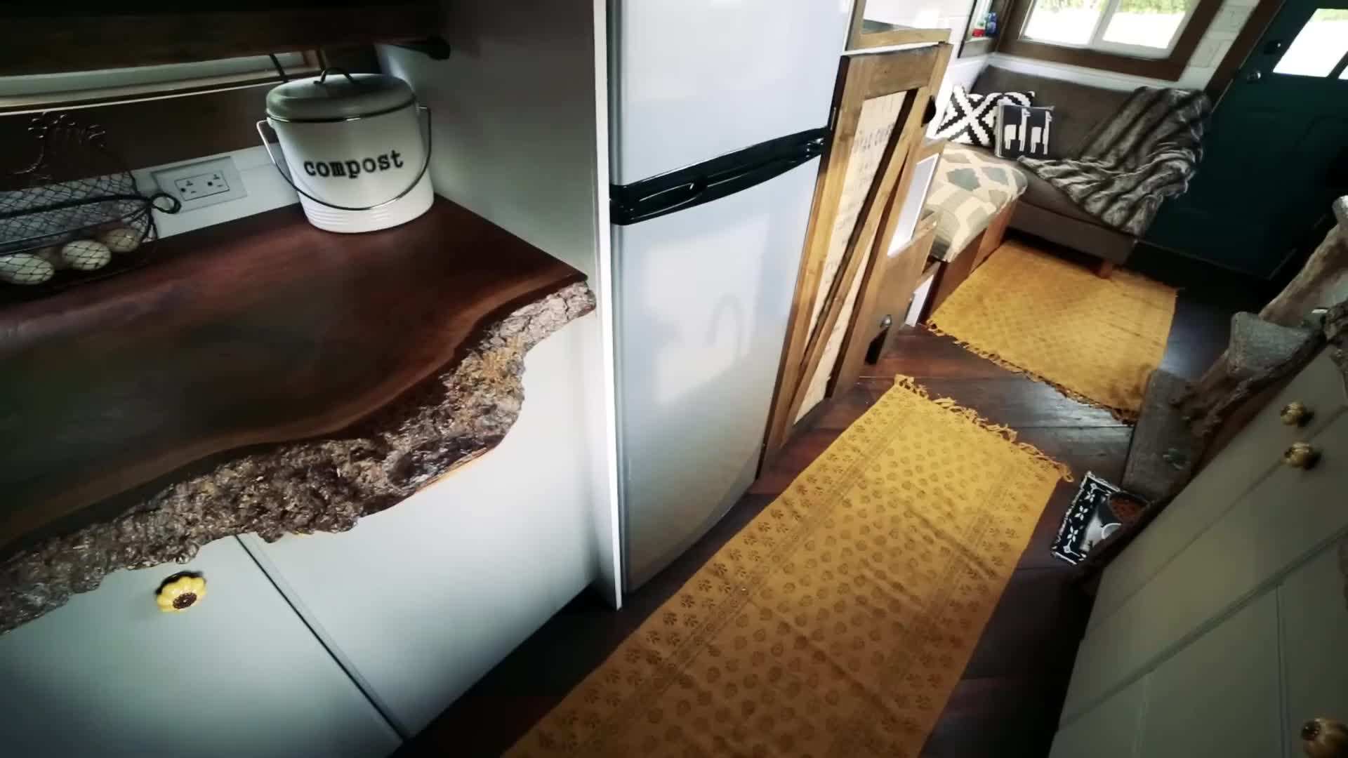 A close-up of minimalistic kitchen design with open shelving and natural materials