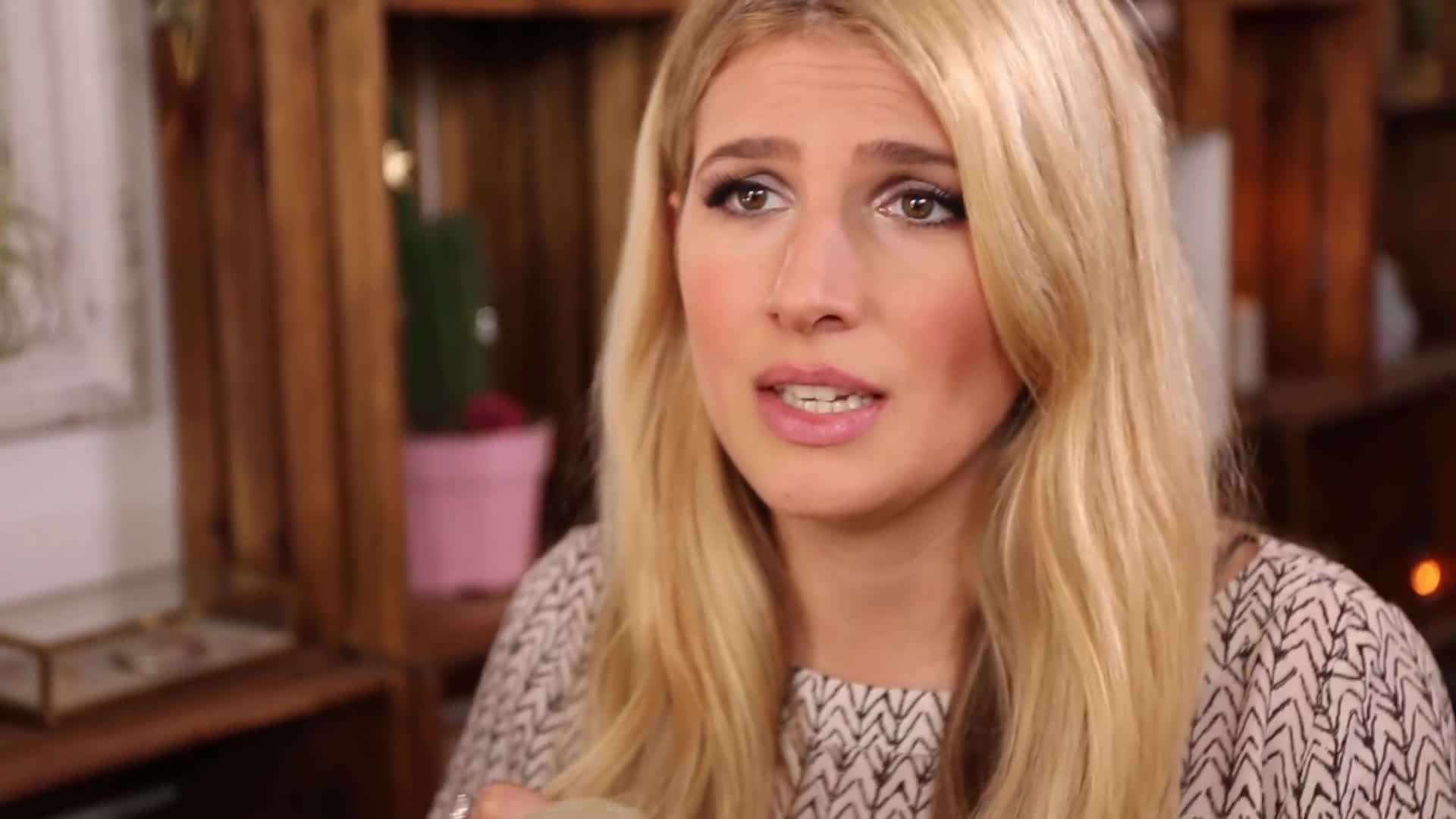 Flirty red dress paired with black heels and delicate jewelry