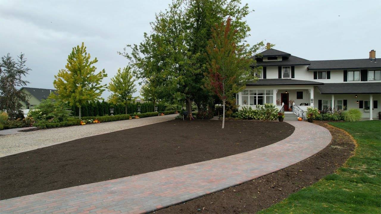 Spreading Compost and Planting a New Hibiscus Variety: A Gardening Guide