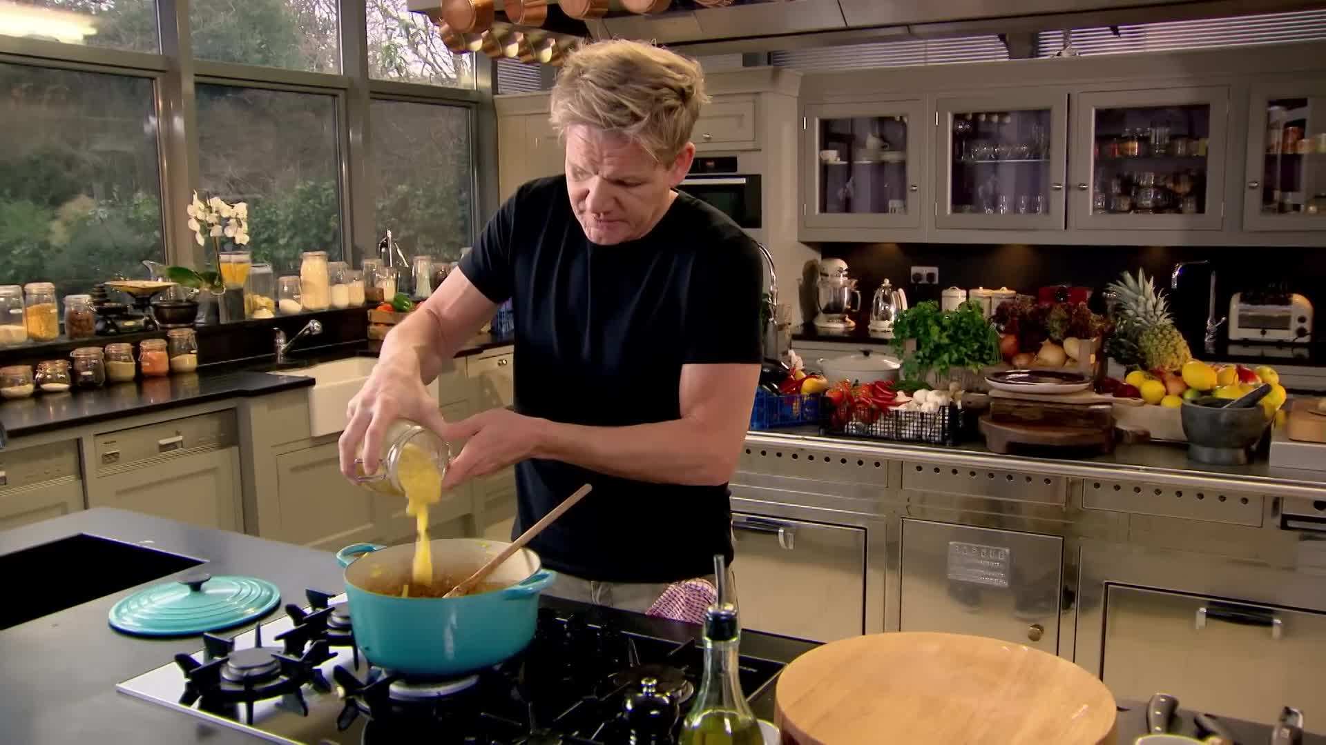 Adding onions, garlic, and potatoes