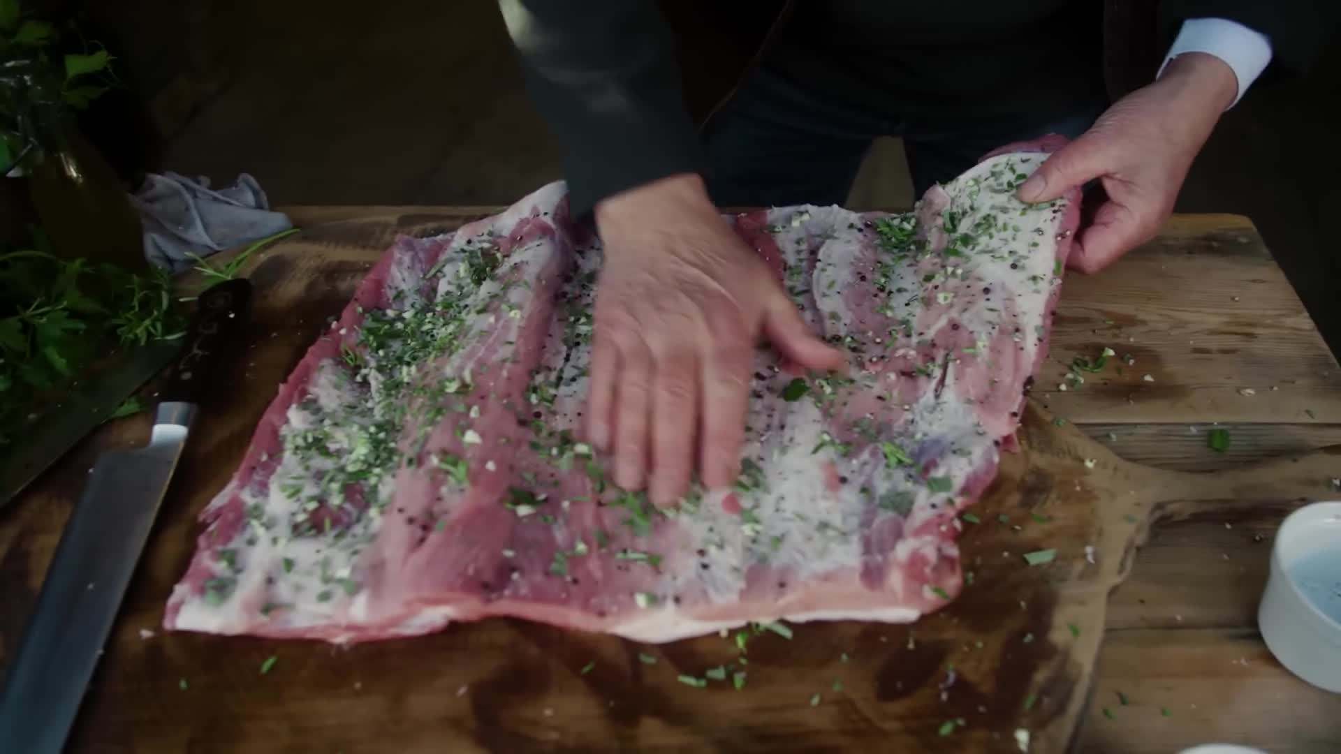 The golden and crispy skin of the porchetta