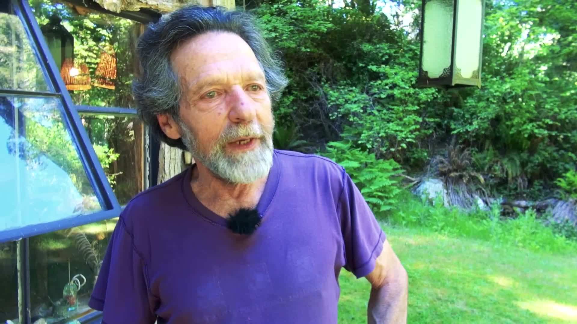 Alban in his woodland cabin