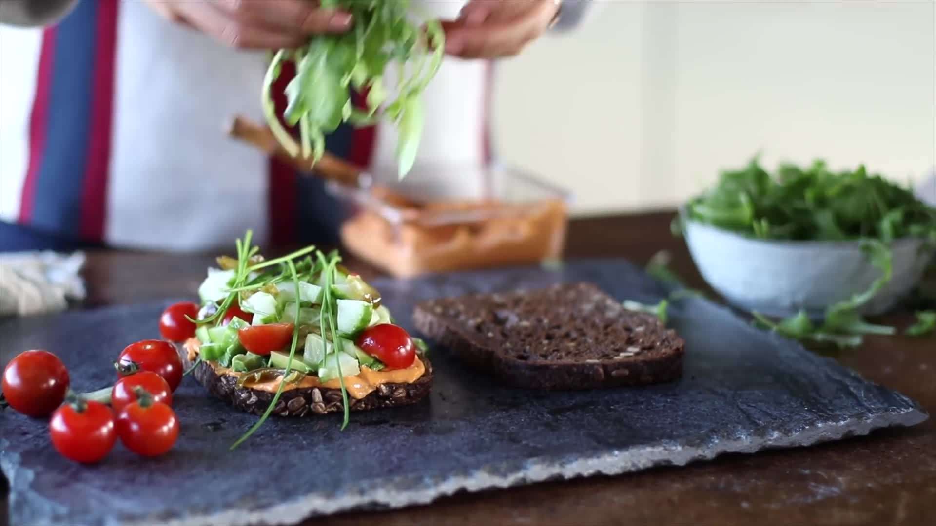 Tofu scramble with sautéed vegetables and avocado