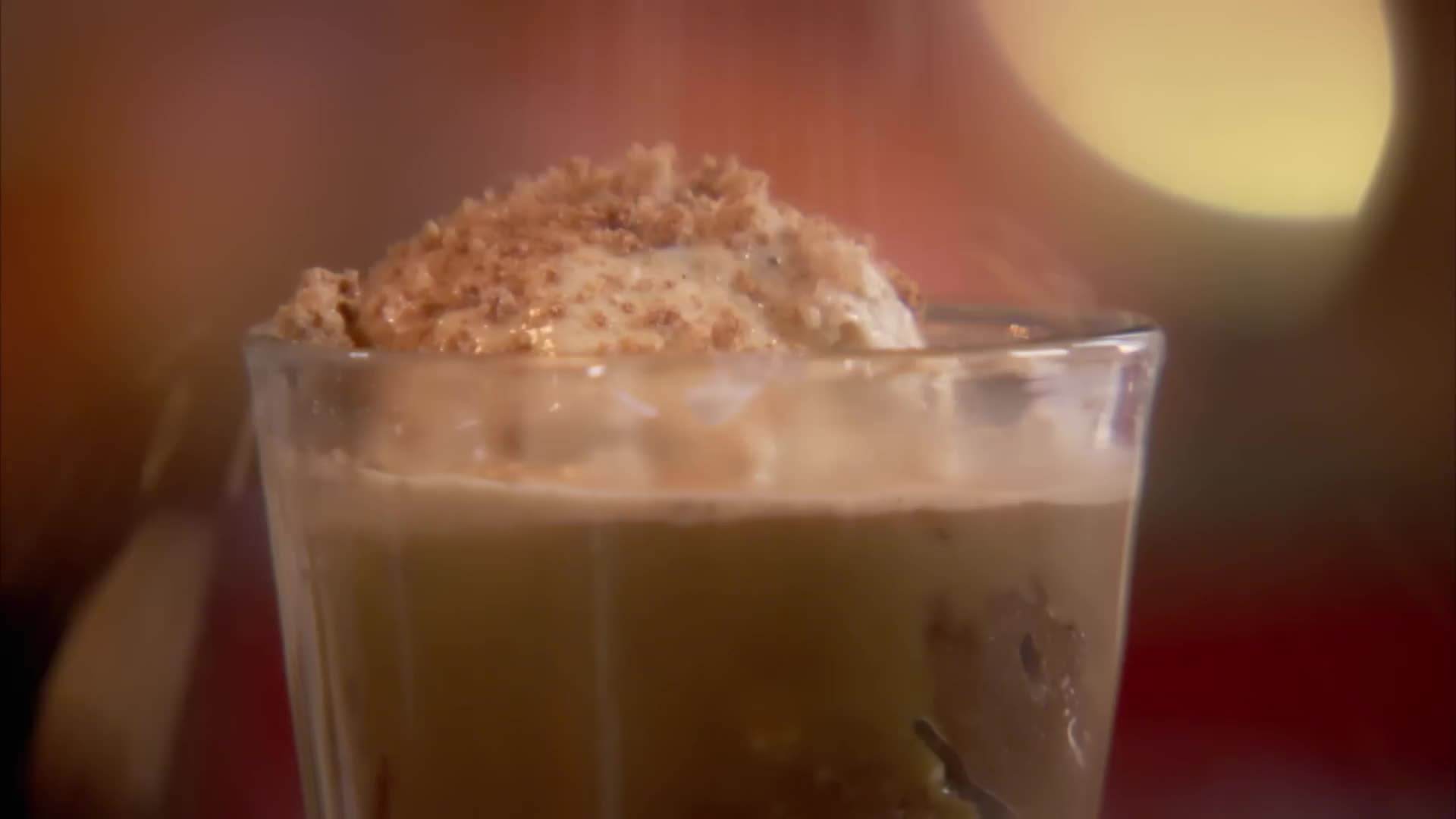 Layering the softened apples over the ginger biscuits