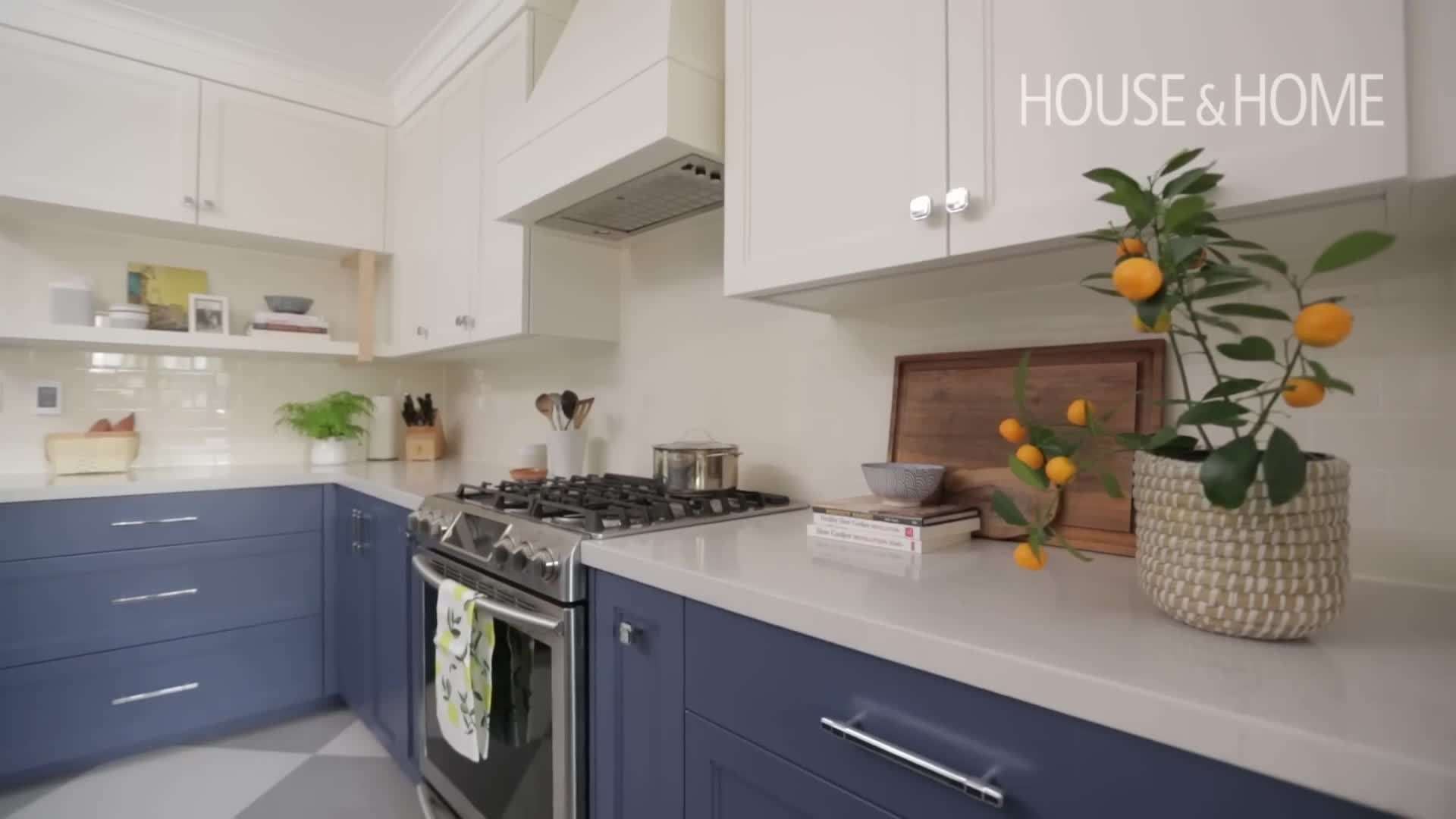 Blue and white kitchen with powder blue cabinets and white countertops