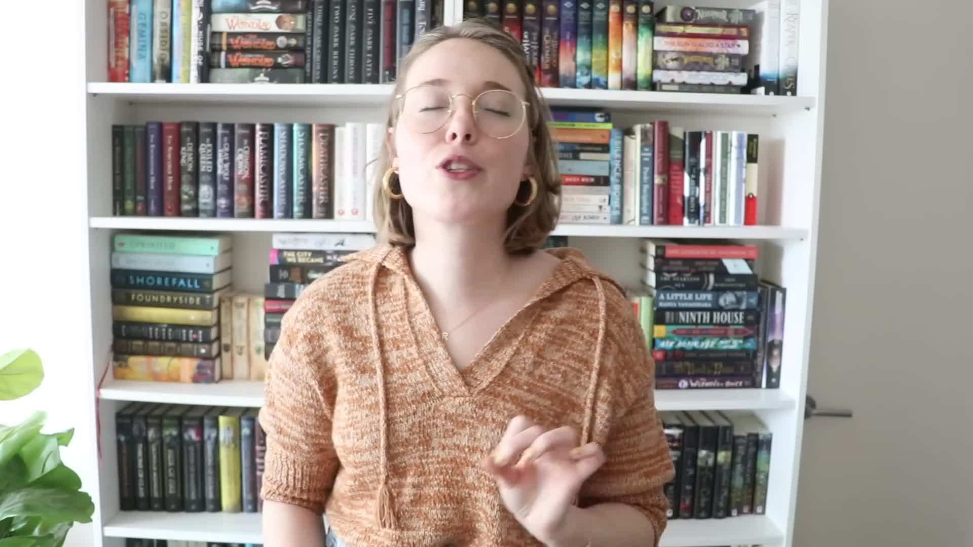 Organized bookshelf after the un-haul