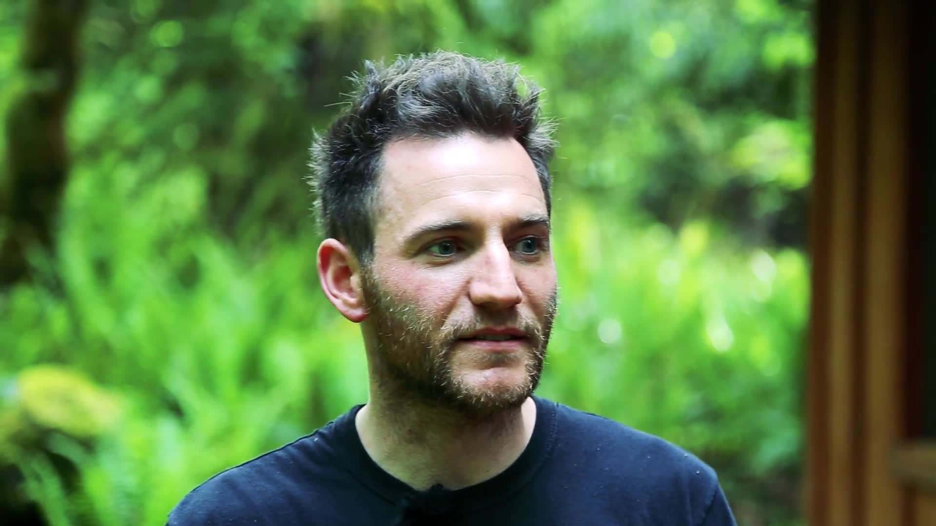 Exterior of the enchanting cabin in the Olympic rainforest