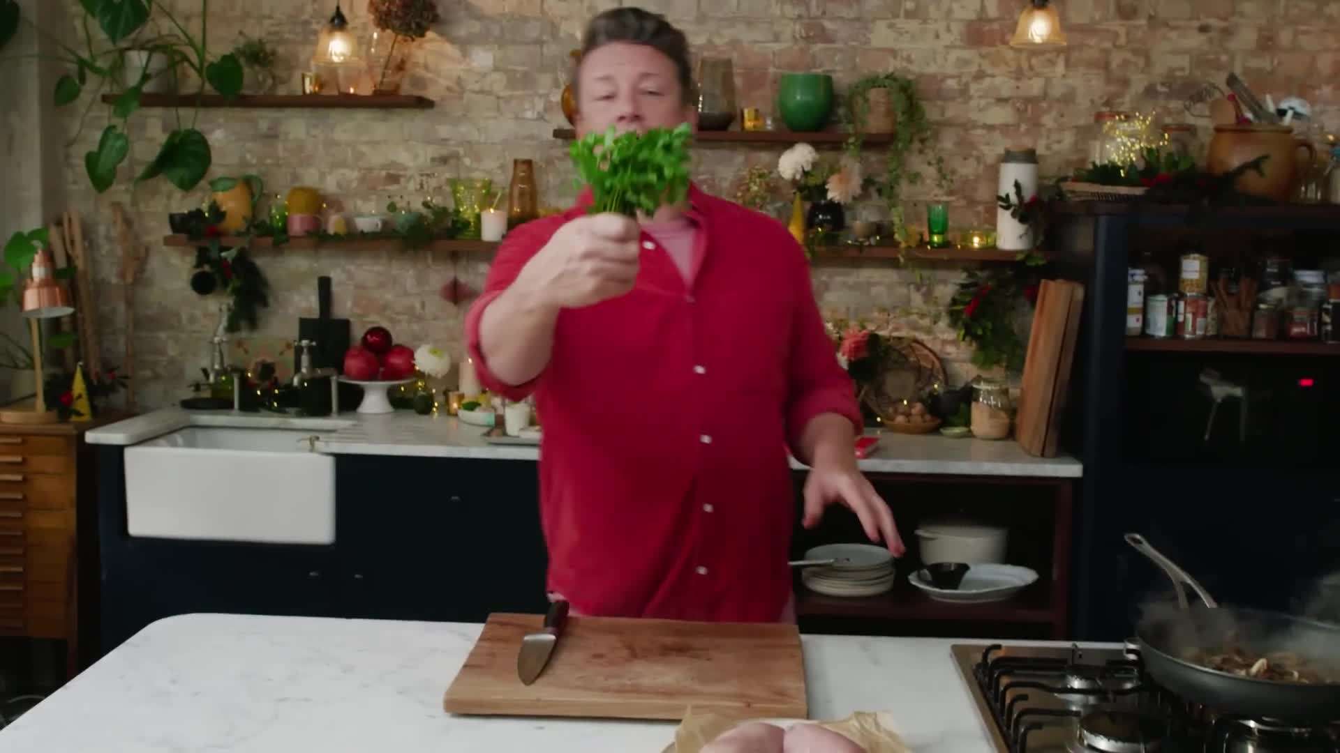 Seasoning the chicken with salt and pepper
