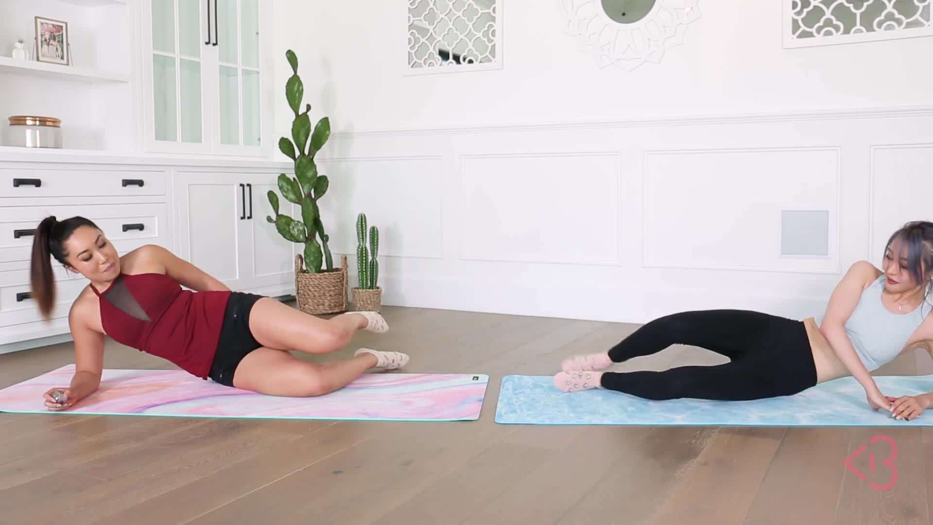 Close-up of proper form for the Mermaid Front Raise exercise