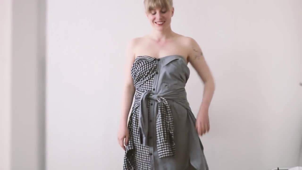 Styling the shirt as a dress with a belt