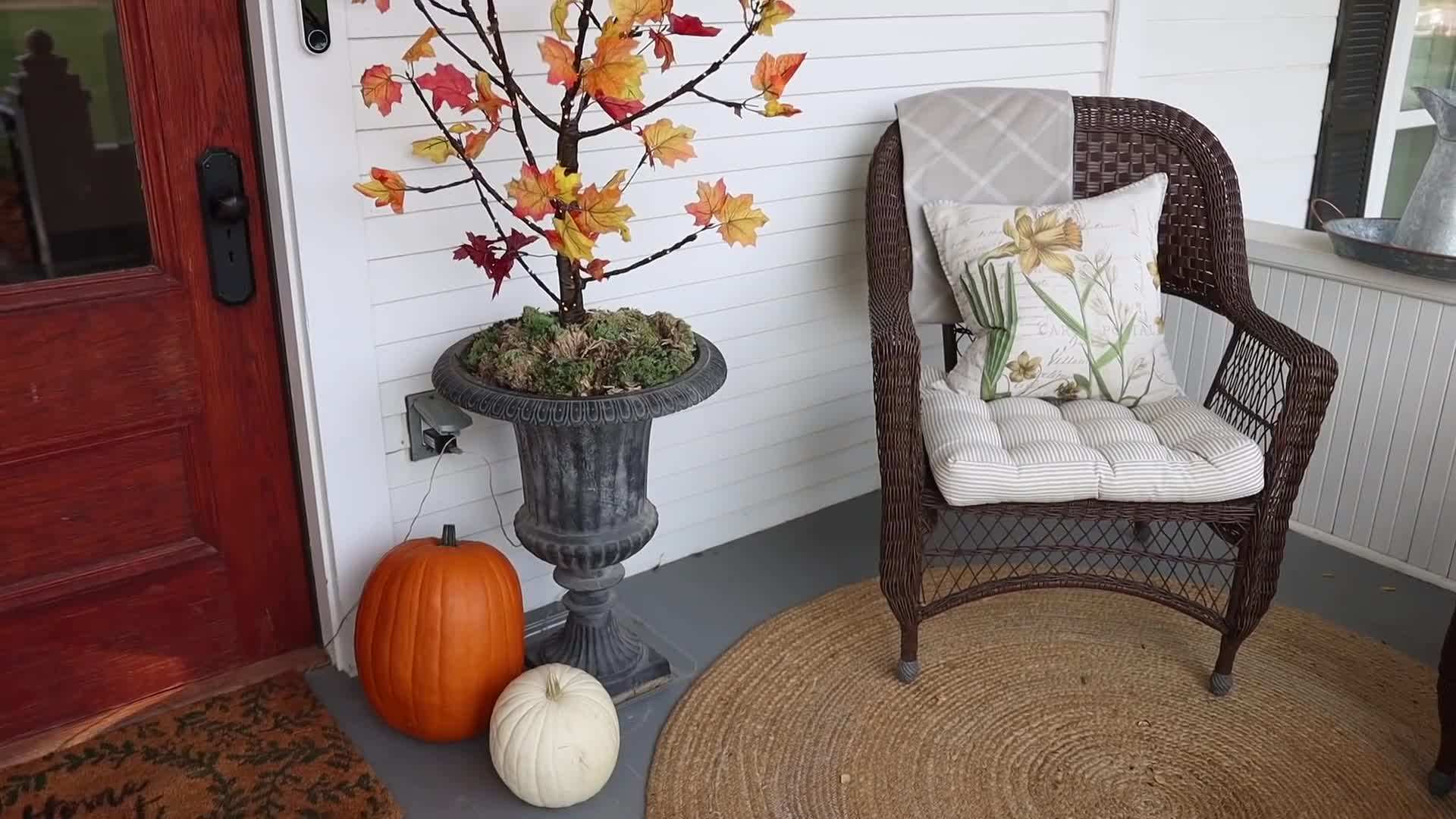 Arrange faux fall leaves or flowers on the branches