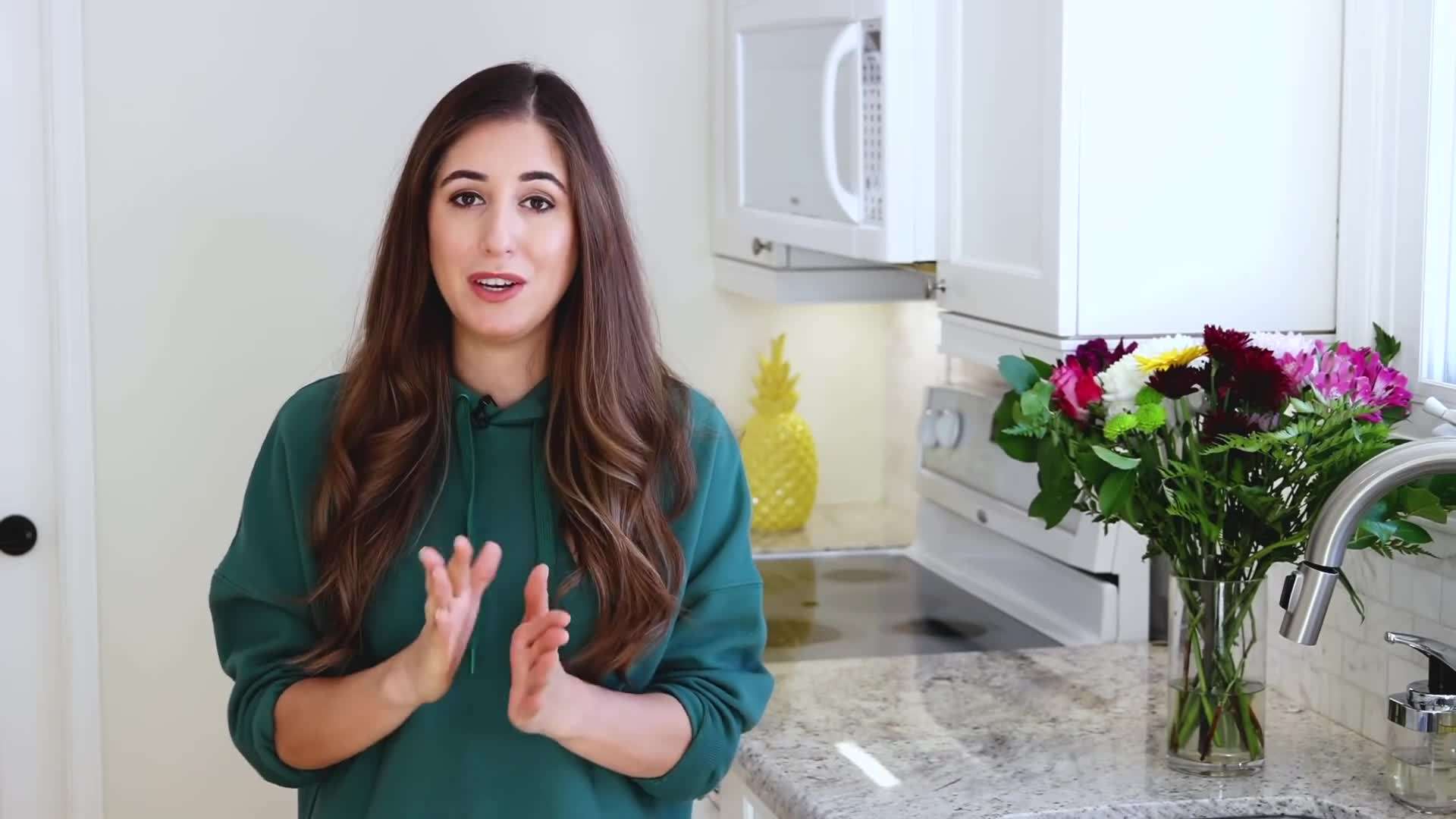 Cleaning the oven door with glass cleaner