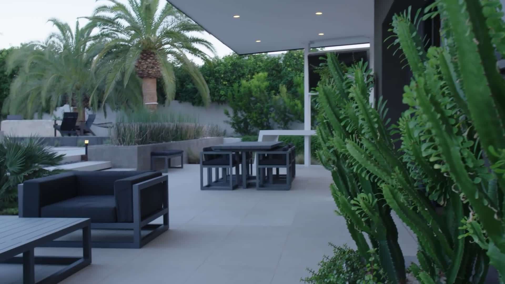 Luxurious bedroom with plush furnishings and soft lighting