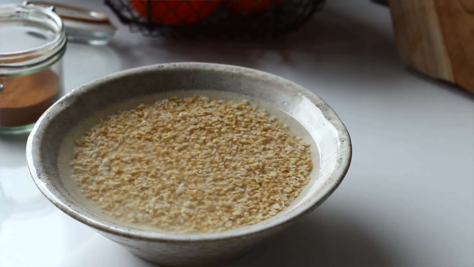 Chia pudding topped with mango and coconut flakes