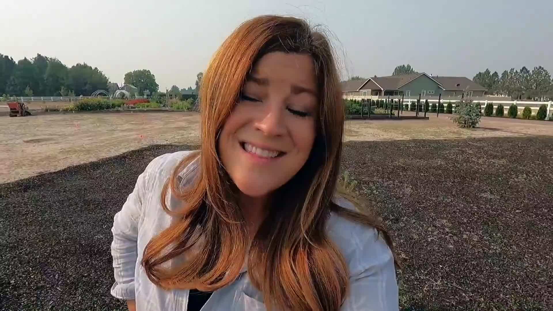 Adding compost to improve soil fertility