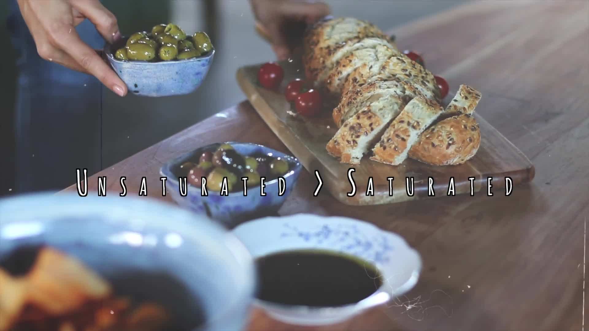 Plate of colorful vegetables drizzled with olive oil