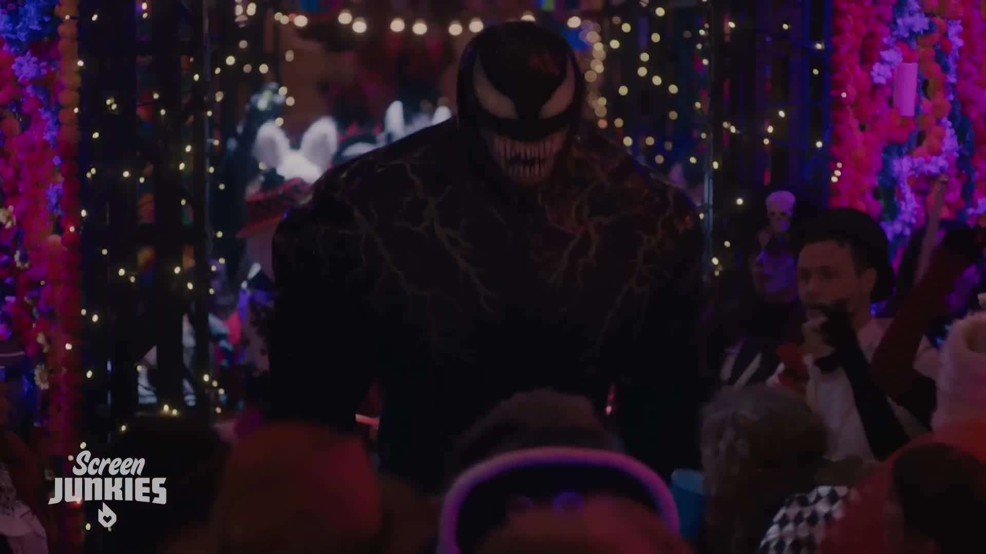 Humorous banter between Eddie Brock and Venom