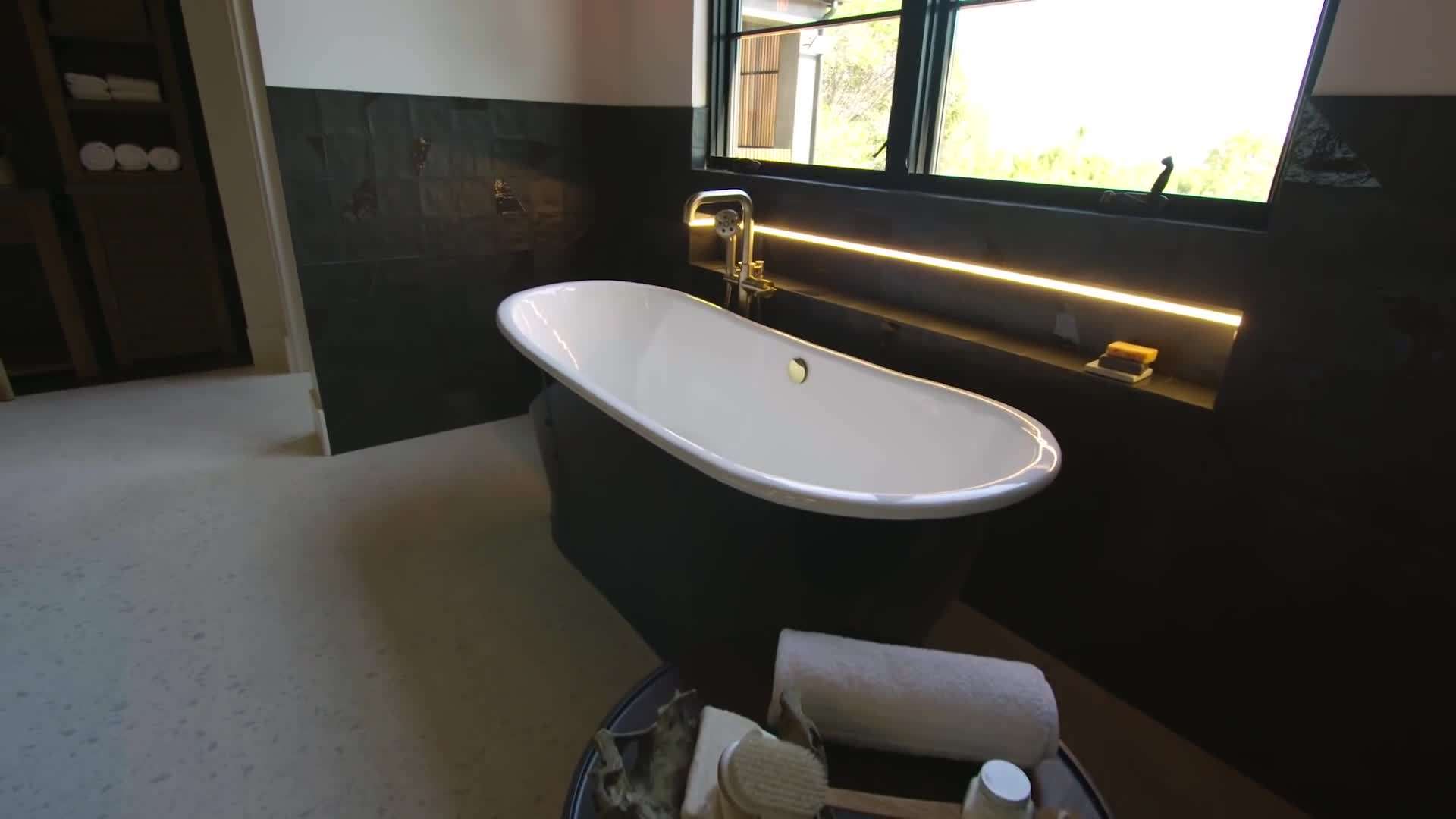 Spacious living area with floor-to-ceiling windows