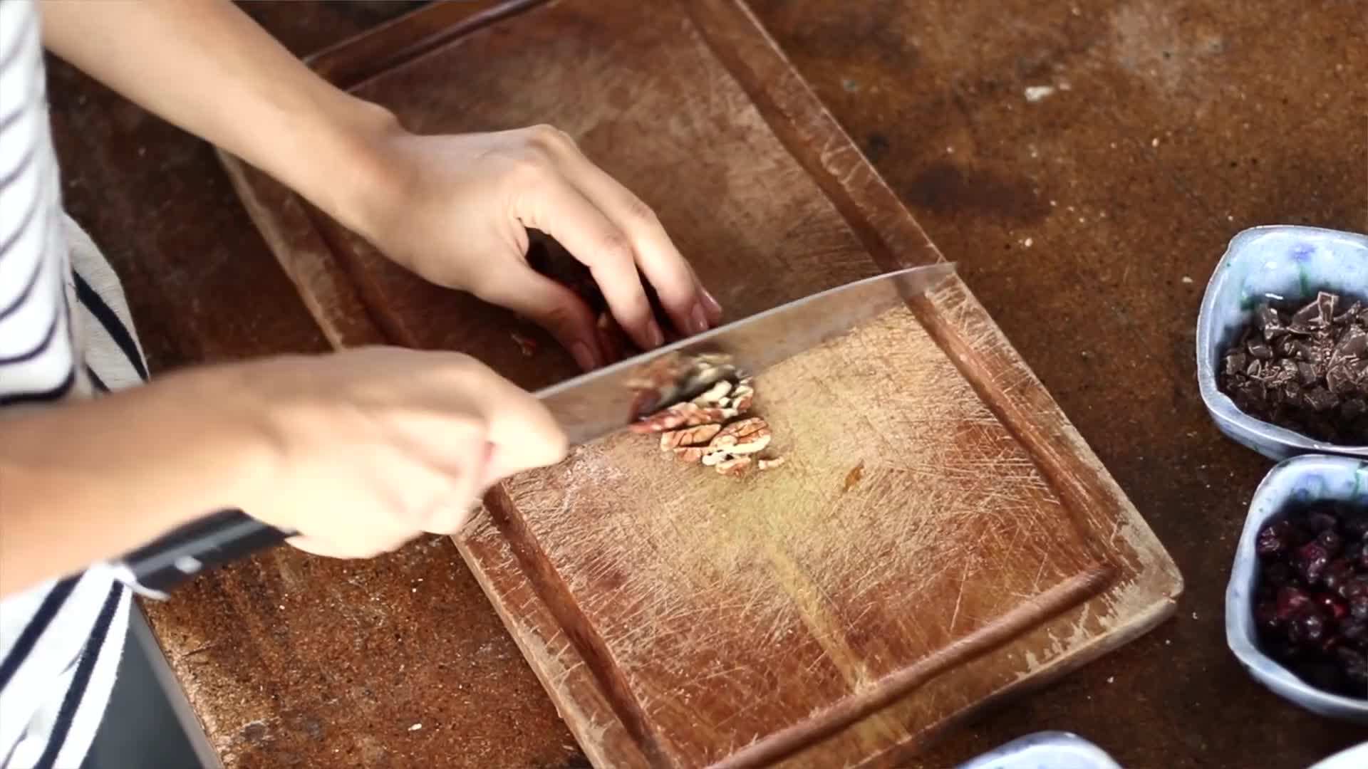 Stack of vegan pancakes with berries and maple syrup