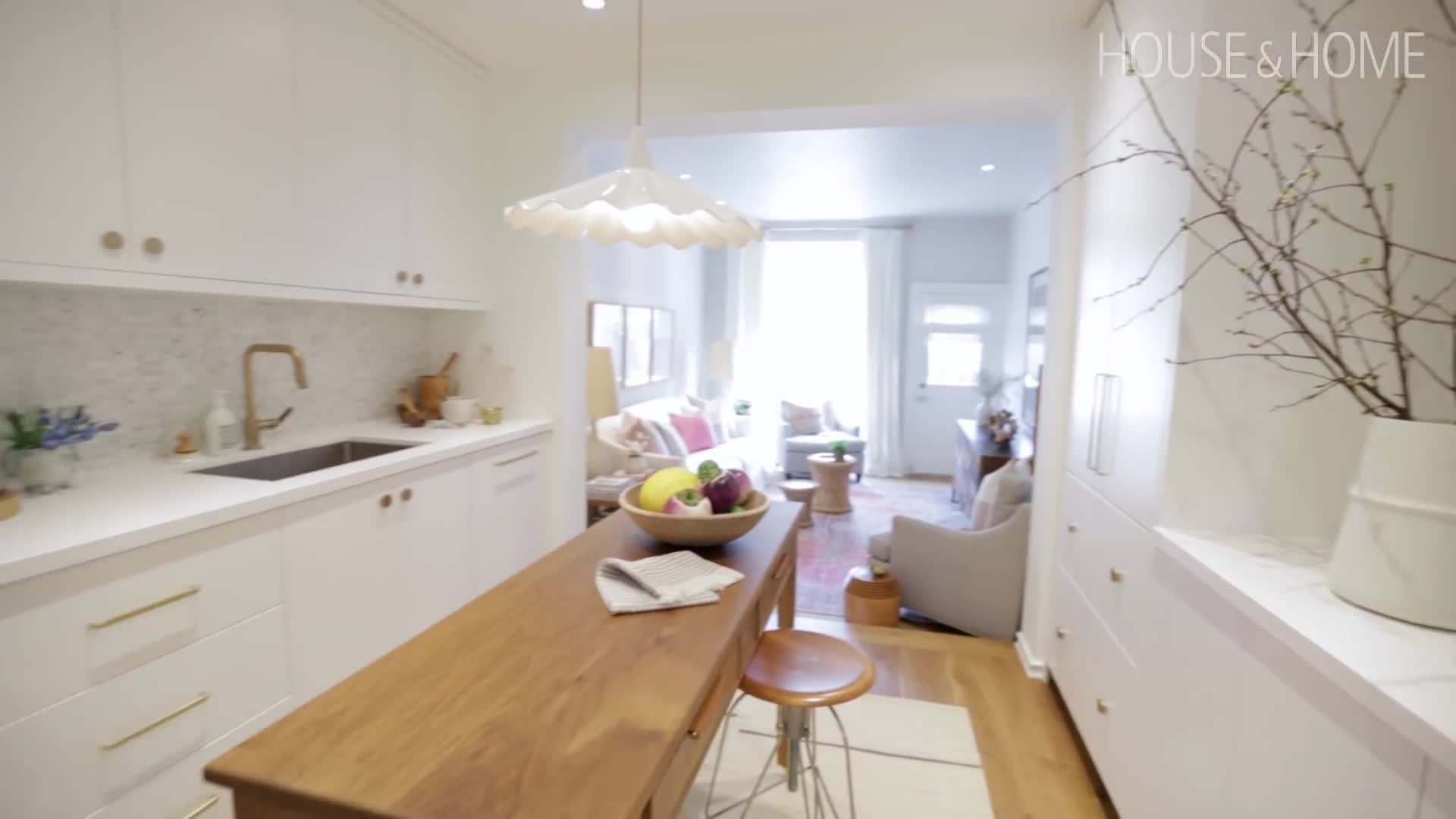 Stephanie measuring the height for proper art placement