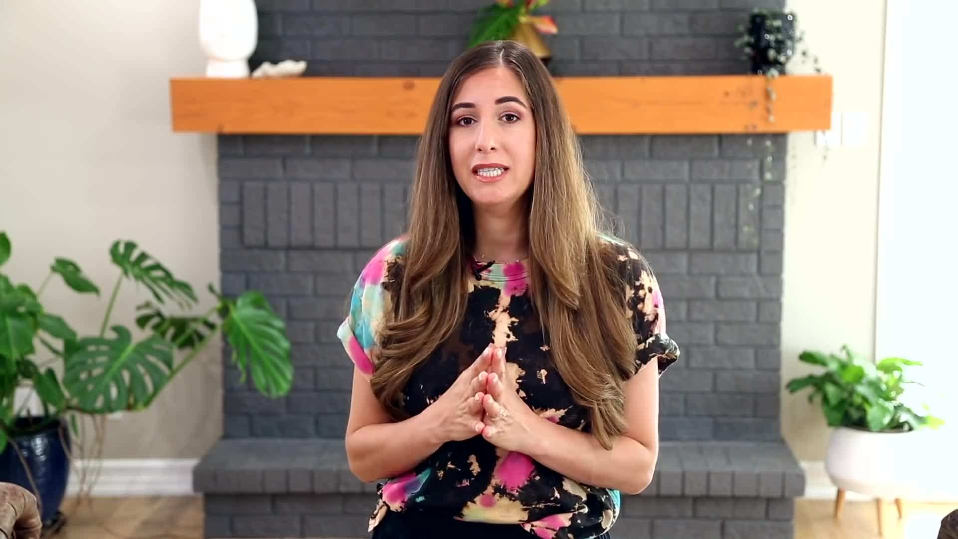 Wiping a countertop with a microfiber cloth