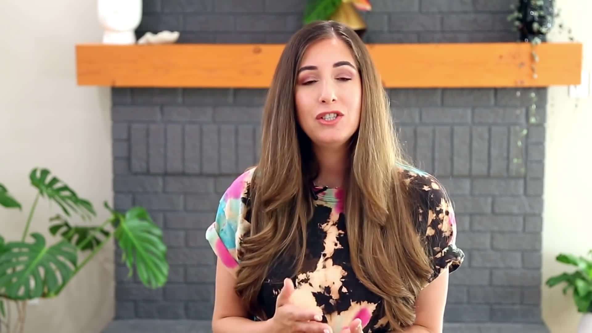 Using a microfiber cloth to clean a window