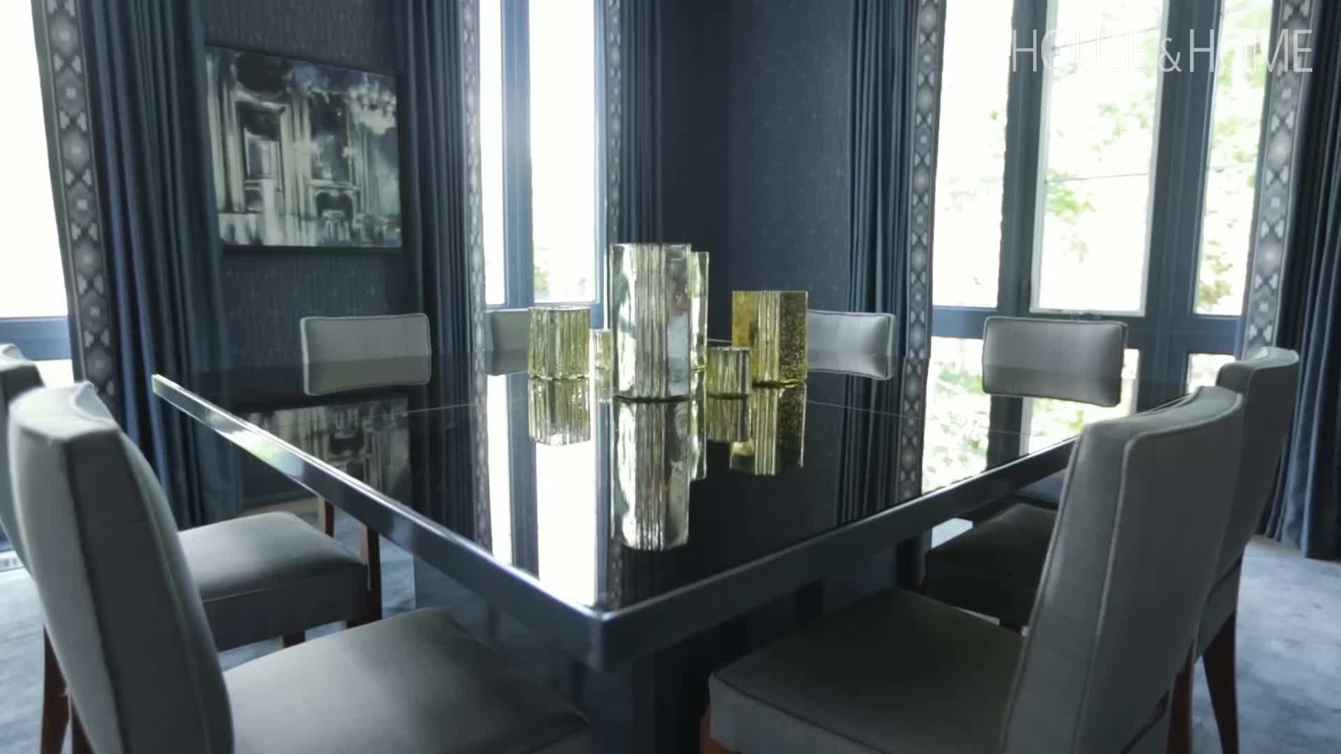 The elegant living room with plush velvet sofas