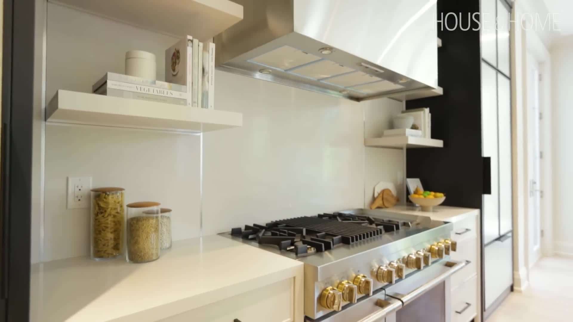 The beautifully designed kitchen with luxurious marble countertops